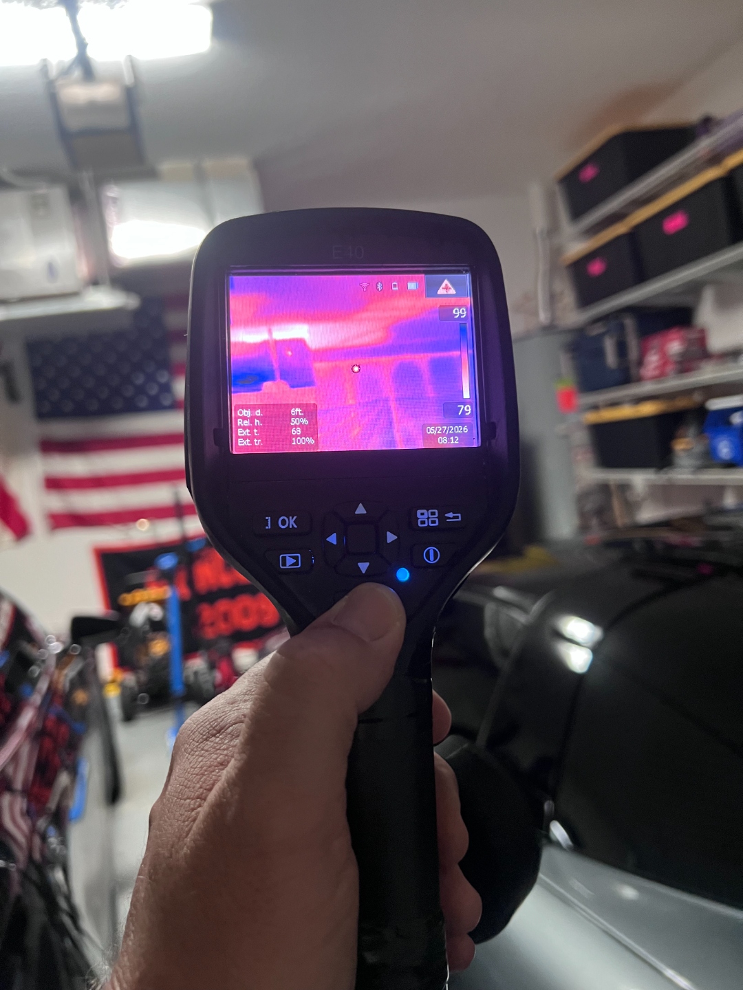 Thermal imaging camera view showing a temperature anomaly consistent with hidden moisture behind a wall