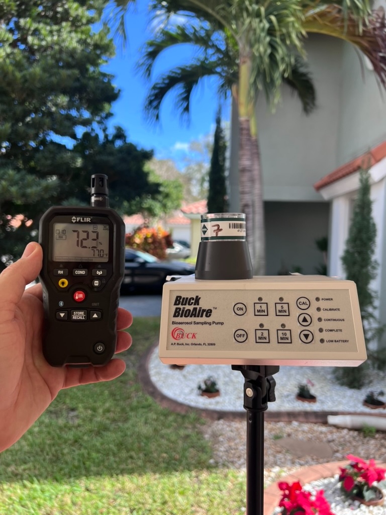 Exterior air sampling being performed at a South Florida property
